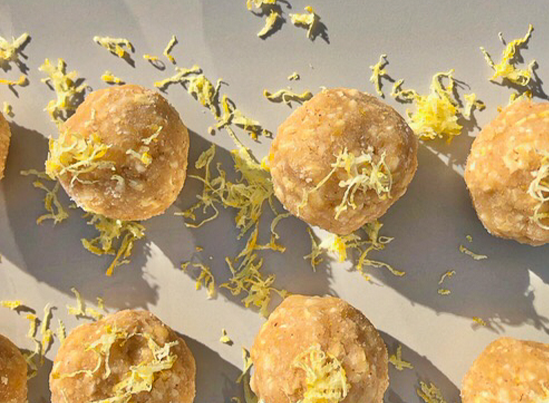 Collagen lemon Drops on a baking sheet with lemon zest