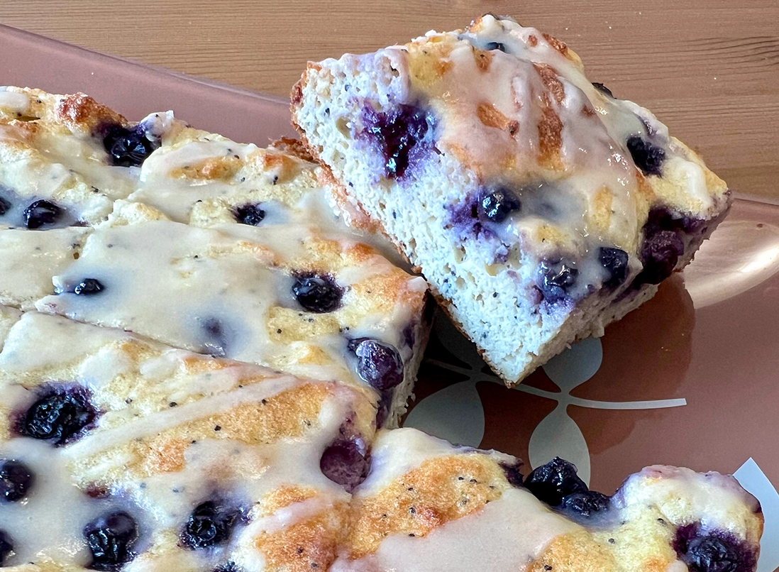 Lemon Blueberry Poppy Seed Squares on a serving plate