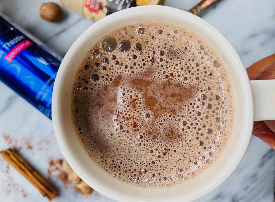 Wholesome frothy gingerbread latte in a warm mug