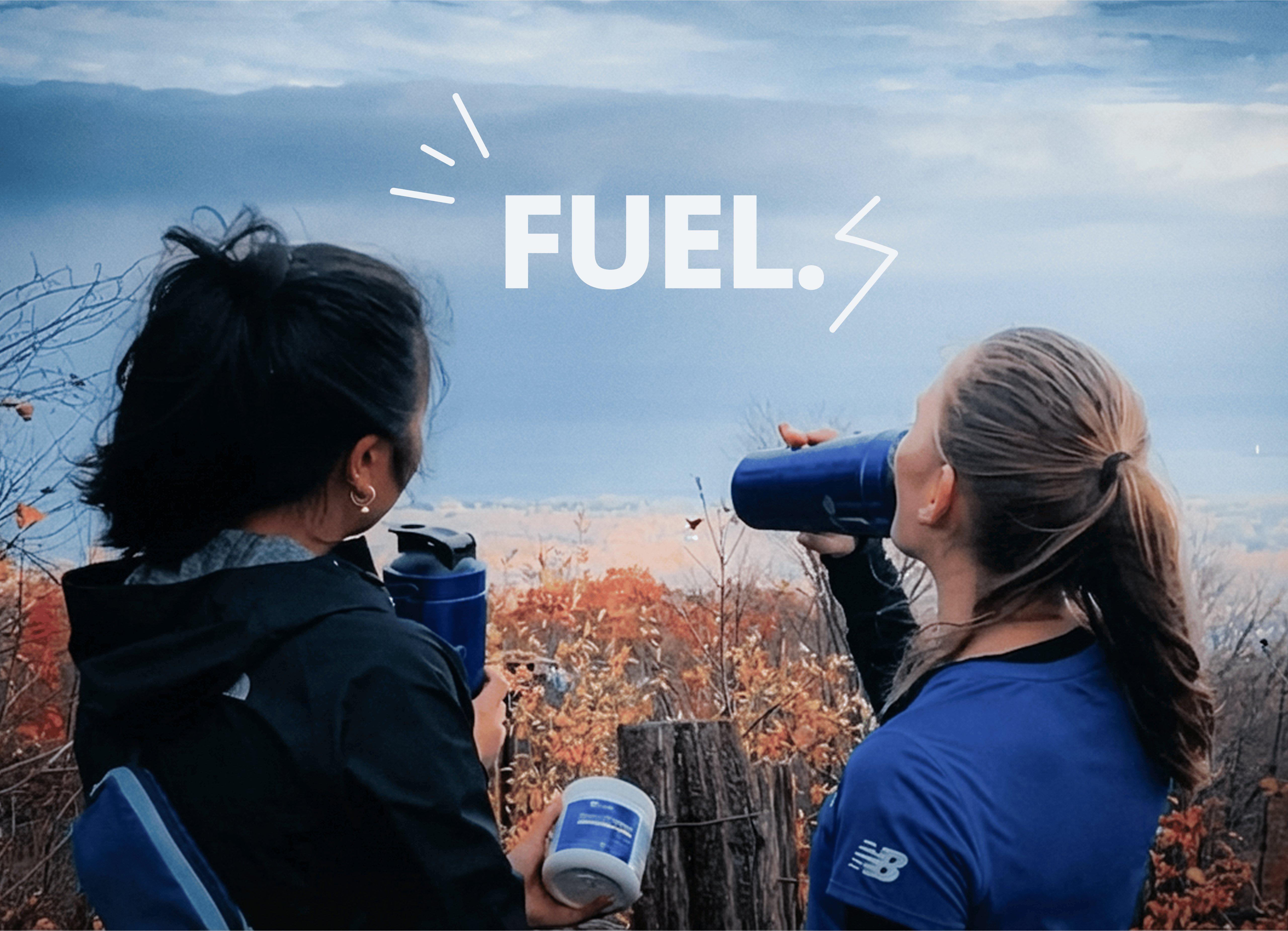 Two people in athletic gear share blue water bottles outdoors, with a bold 'FUEL' graphic over a blue sky backdrop.