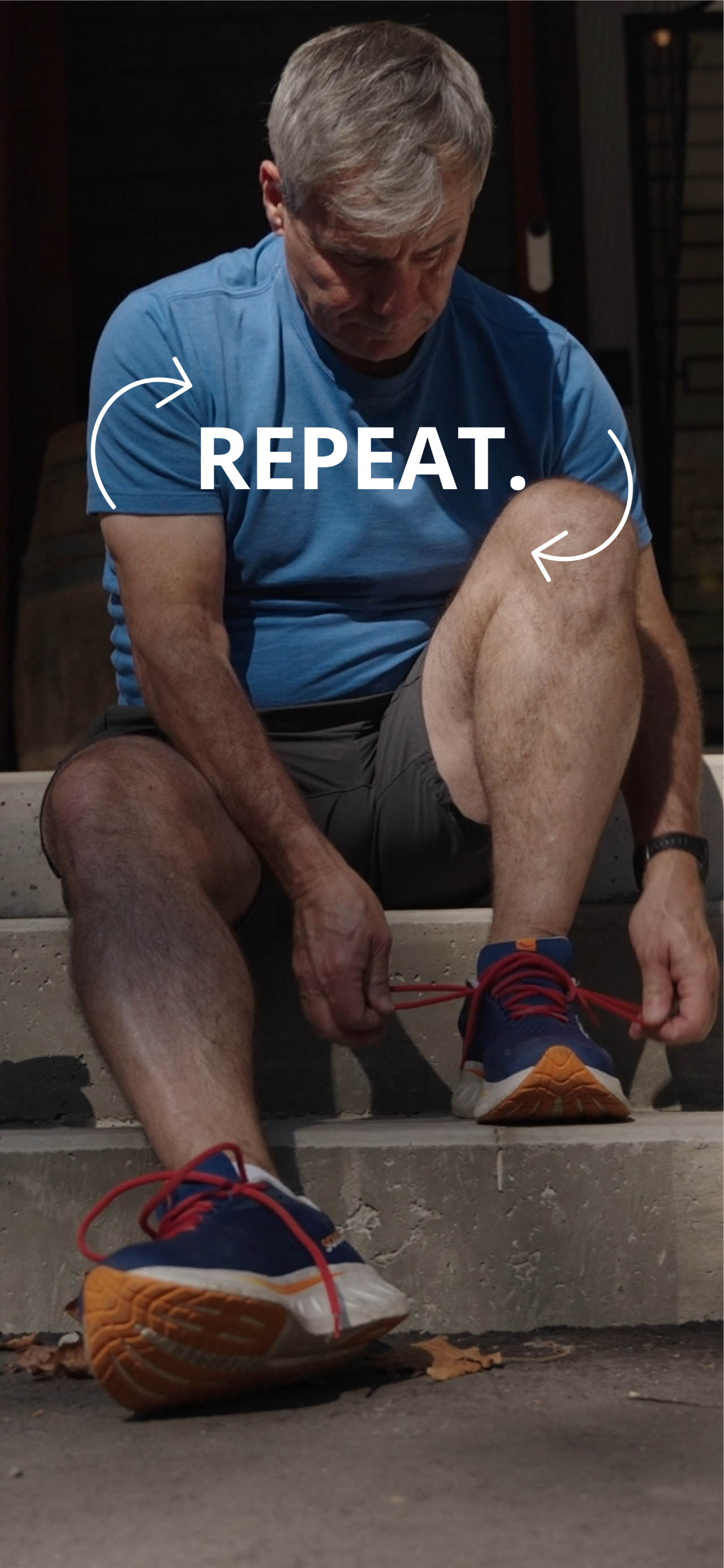 Older man in a blue shirt sits on outdoor steps, tying bright red shoelaces while looking down; overlay text reads 'REPEAT.'