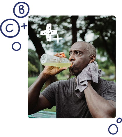 Man in a park drinks water from a bottle after a workout, towel around his neck and a hydration theme overlayed by plus signs in the background.